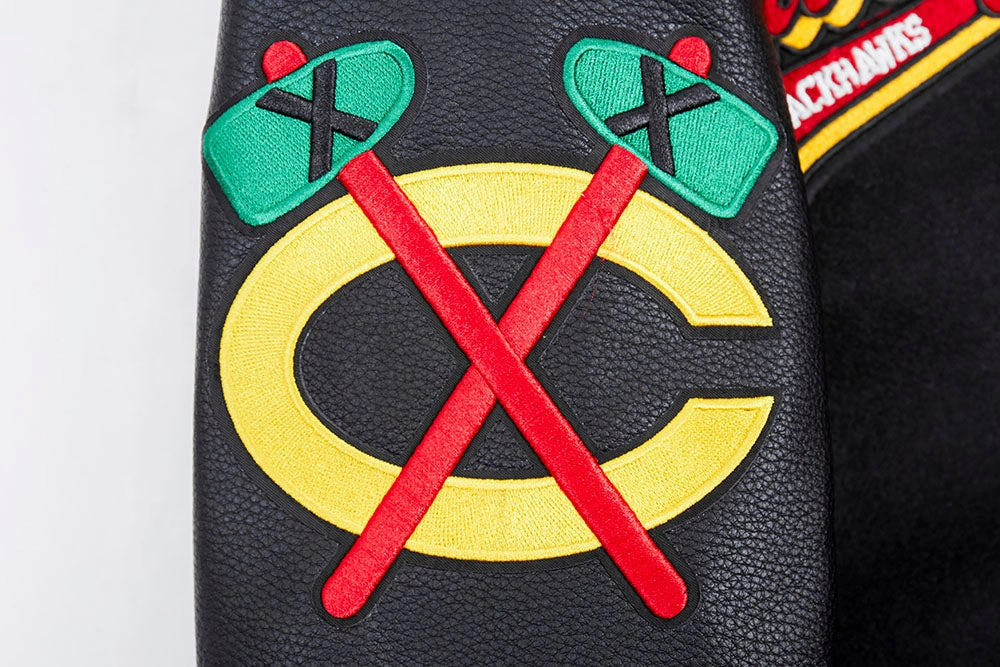 CHAMARRA UNIVERSITARIA NHL CHICAGO BLACKHAWKS SCRIPT TAIL