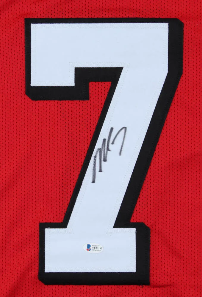 Michael Vick Signed Atlanta Falcons Red Jersey (Beckett COA) 4Pro Bowl QB
